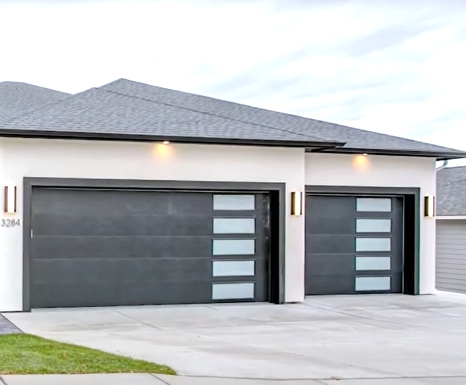 Professional technician performing garage door repair in Nokomis, FL, using specialized tools to lift and realign the garage door for optimal functionality.