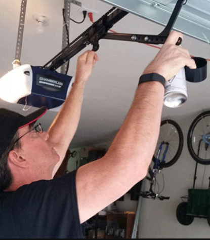 Professional technician repairing a garage door opener at Dublin Garage Door Repair in Nokomis, FL, highlighting expert garage door opener repair services.